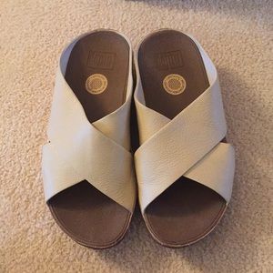 cork bottom, leather top, bone color. Gently worn.